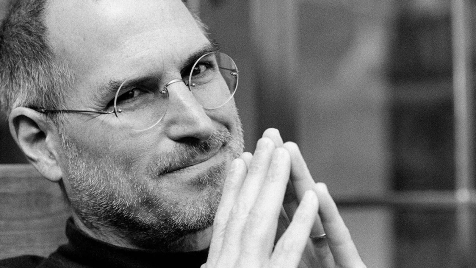 Steve Jobs mit randloser Brille, Symbol des Minimalismus